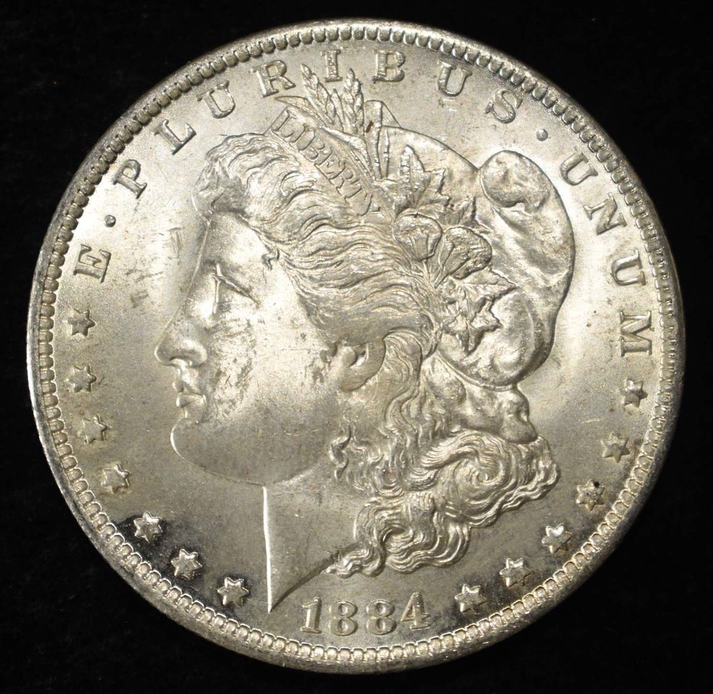 1884-O MORGAN DOLLAR BU. WEEKLY COIN & CURRENCY AUCTIONS ESTIMATE $130 - $150.