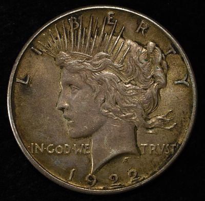 1922 PEACE DOLLAR. TOP RATED AUCTION HOUSE ESTIMATE $90 - $130.