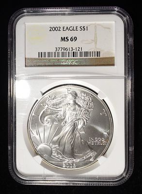 2002 AMERICAN SILVER EAGLE NGC MS69. BID WITH SILVER CITY AUCTIONS ESTIMATE $120 - $170.