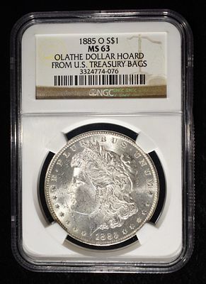 1885-O MORGAN DOLLAR NGC MS-63 OLATHE HOARD. TOP RATED AUCTION HOUSE ESTIMATE $130 - $150.