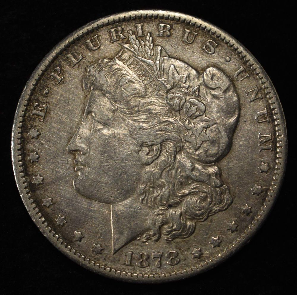 1878-CC MORGAN DOLLAR XF/AU. TOP RATED AUCTION HOUSE ESTIMATE $300 - $350.