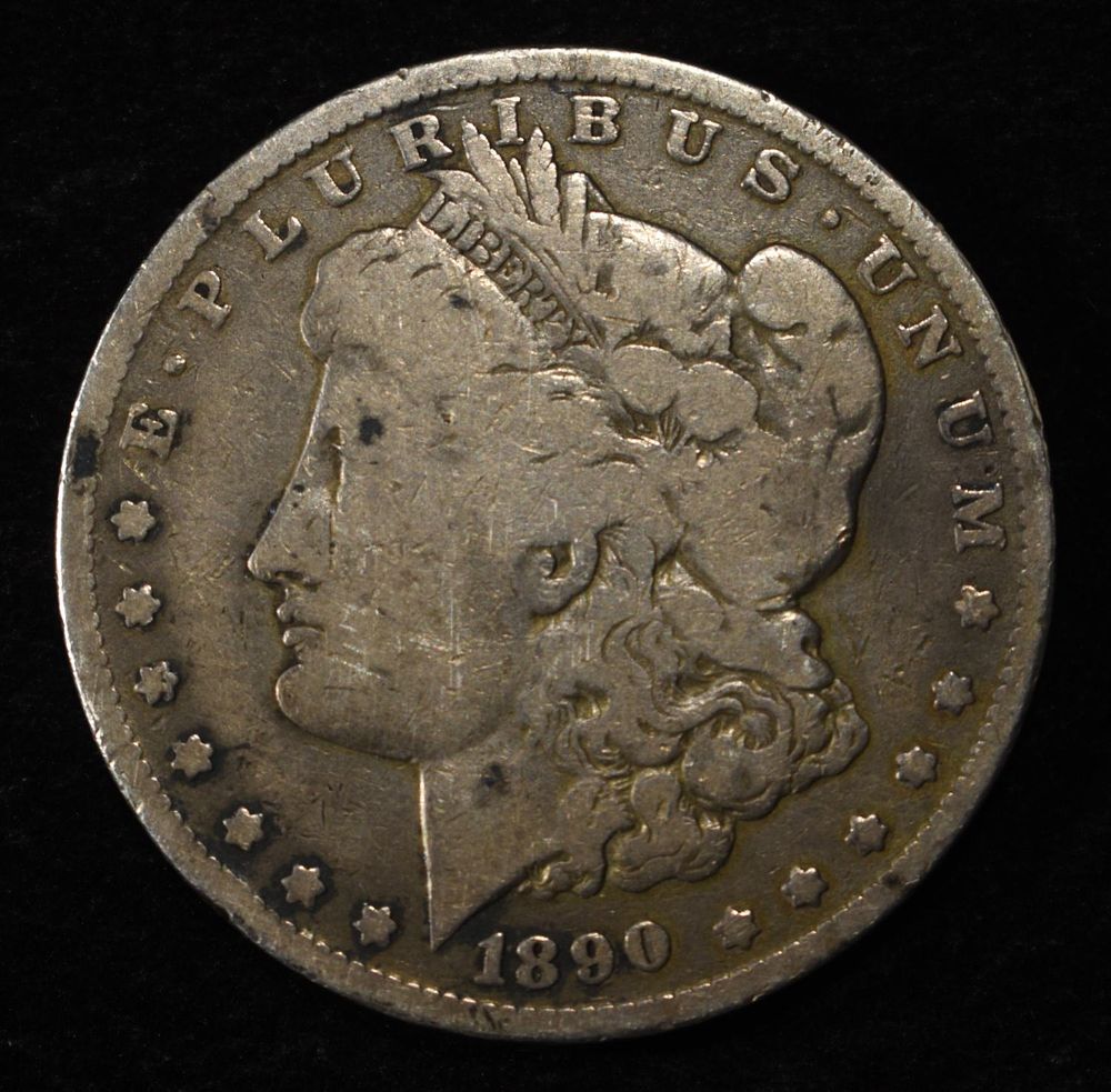 1890-O MORGAN DOLLAR. LEADERS IN ON-LINE AUCTIONS ESTIMATE $90 - $130.