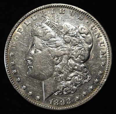 1893 MORGAN DOLLAR XF/AU. BID WITH SILVER CITY AUCTIONS ESTIMATE $700 - $800.