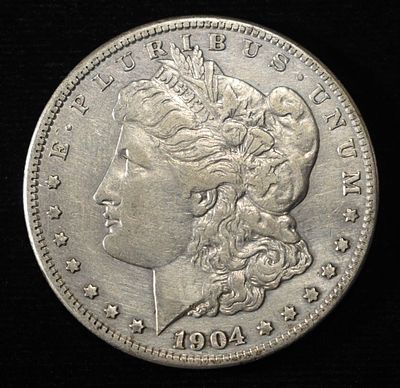 1904-S MORGAN DOLLAR XF. LEADERS IN ON-LINE AUCTIONS ESTIMATE $500 - $600.