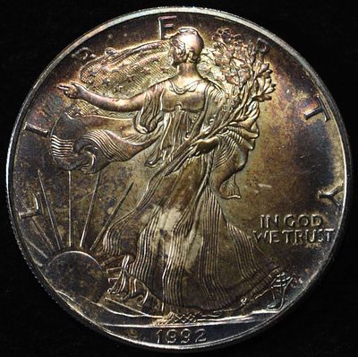 1992 AMERICAN SILVER EAGLE. LEADERS IN ON-LINE AUCTIONS ESTIMATE $110 - $160.