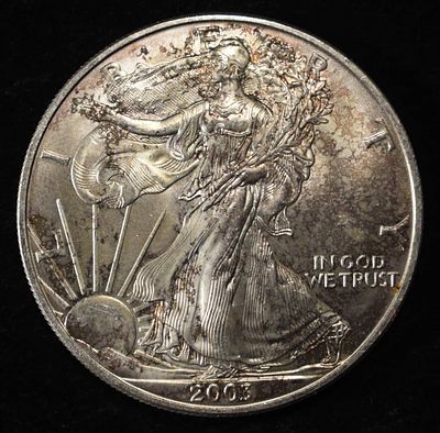 2003 AMERICAN SILVER EAGLE. WEEKLY COIN & CURRENCY AUCTIONS ESTIMATE $110 - $160.