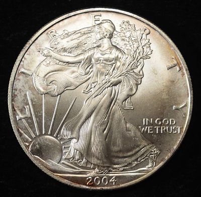 2004 AMERICAN SILVER EAGLE. BID WITH SILVER CITY AUCTIONS ESTIMATE $130 - $180.