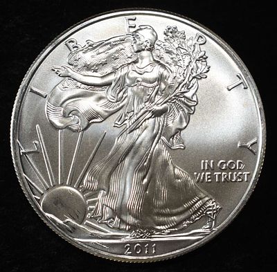 2011 AMERICAN SILVER EAGLE. CHECK OUT OUR UPCOMING AUCTIONS ESTIMATE $110 - $160.