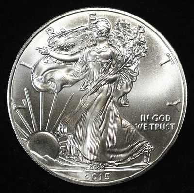 2015 AMERICAN SILVER EAGLE. CHECK OUT OUR UPCOMING AUCTIONS ESTIMATE $130 - $180.