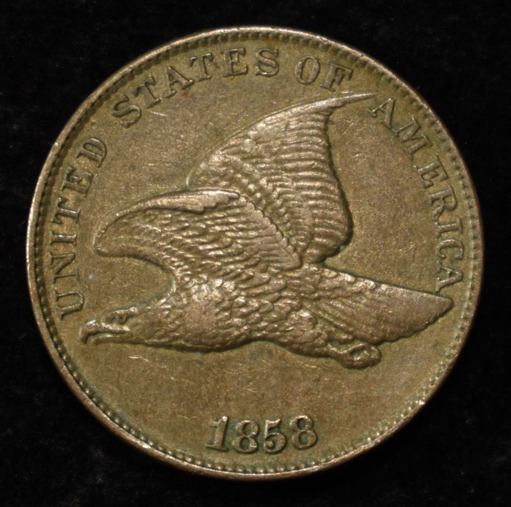 1858 FLYING EAGLE CENT AU. CHECK OUT OUR UPCOMING AUCTIONS ESTIMATE $420 - $470.