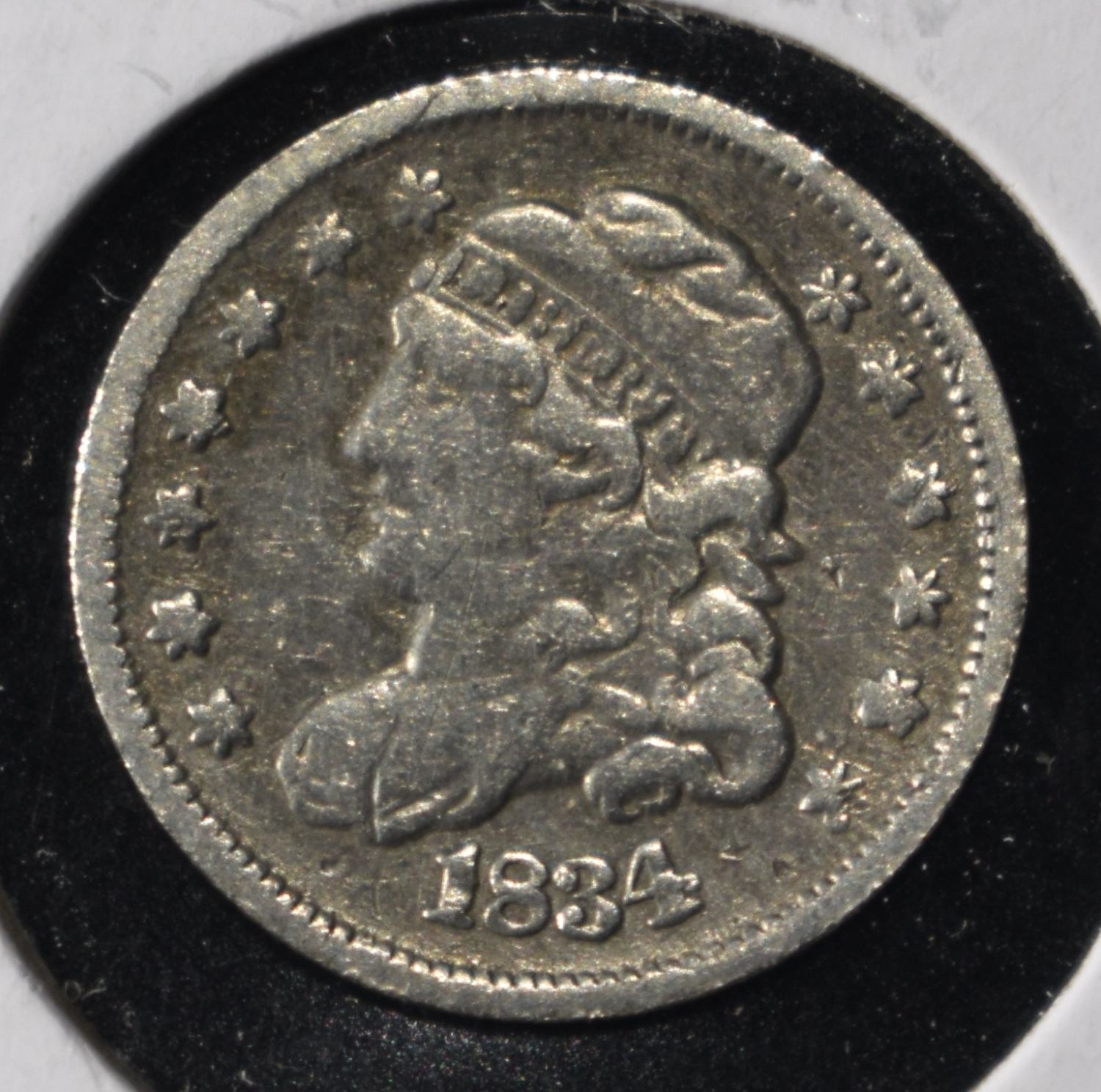 1834 CAPPED BUST HALF DIME CLND. AU