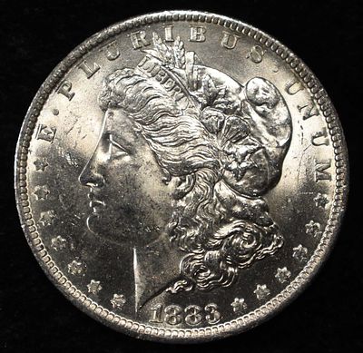 1883-O MORGAN DOLLAR UNC. LEADERS IN ON-LINE AUCTIONS ESTIMATE $110 - $160.