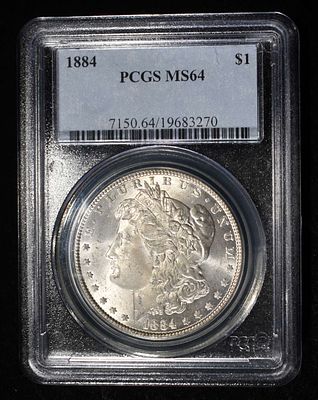 1884 MORGAN DOLLAR PCGS MS-64. BID WITH SILVER CITY AUCTIONS ESTIMATE $150 - $200.