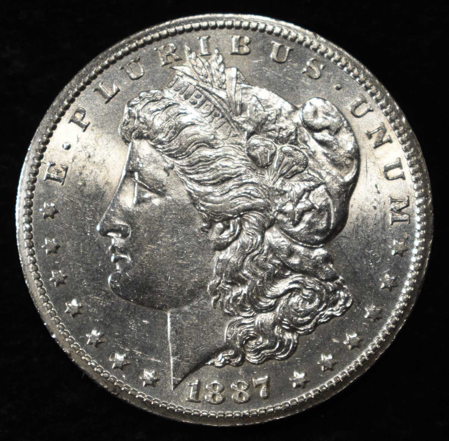 1887-S MORGAN DOLLAR AU