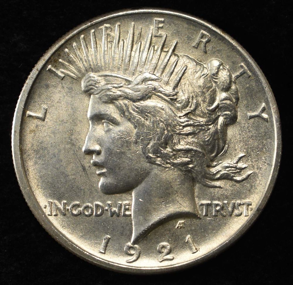 1921 PEACE DOLLAR. BID WITH SILVER CITY AUCTIONS ESTIMATE $600 - $700.
