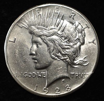 1928 PEACE DOLLAR. TOP RATED AUCTION HOUSE ESTIMATE $300 - $350.