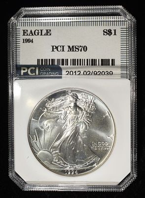 1994 AMERICAN SILVER EAGLE PCI PERFECT GEM BU. BID WITH SILVER CITY AUCTIONS ESTIMATE $100 - $150.