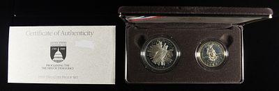 1989-S $1 & 50C COMMEM CONGRESSIONAL. BID WITH SILVER CITY AUCTIONS ESTIMATE $100 - $150.