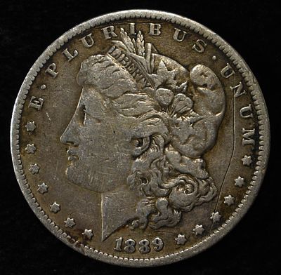 1889-O MORGAN DOLLAR. WEEKLY COIN & CURRENCY AUCTIONS ESTIMATE $75 - $100.