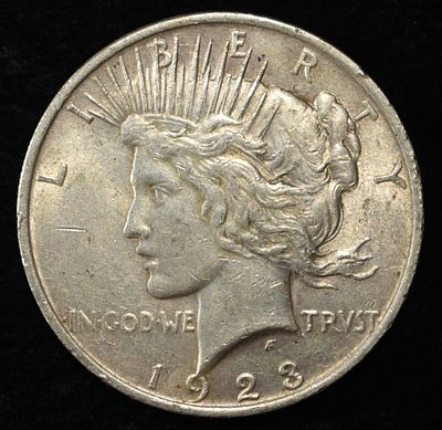 1923 PEACE DOLLAR. TOP RATED AUCTION HOUSE ESTIMATE $90 - $130.