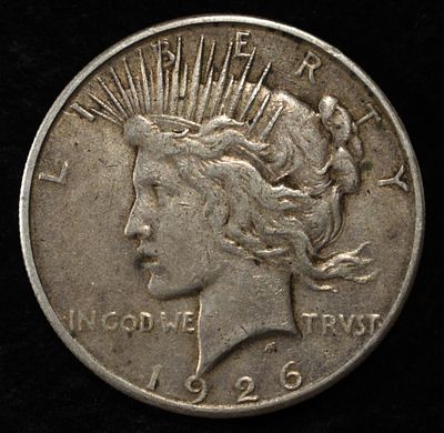 1926-S PEACE DOLLAR. CHECK OUT OUR UPCOMING AUCTIONS ESTIMATE $75 - $100.
