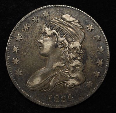 1834 CAPPED BUST HALF DOLLAR AU/BU. TOP RATED AUCTION HOUSE ESTIMATE $700 - $800.