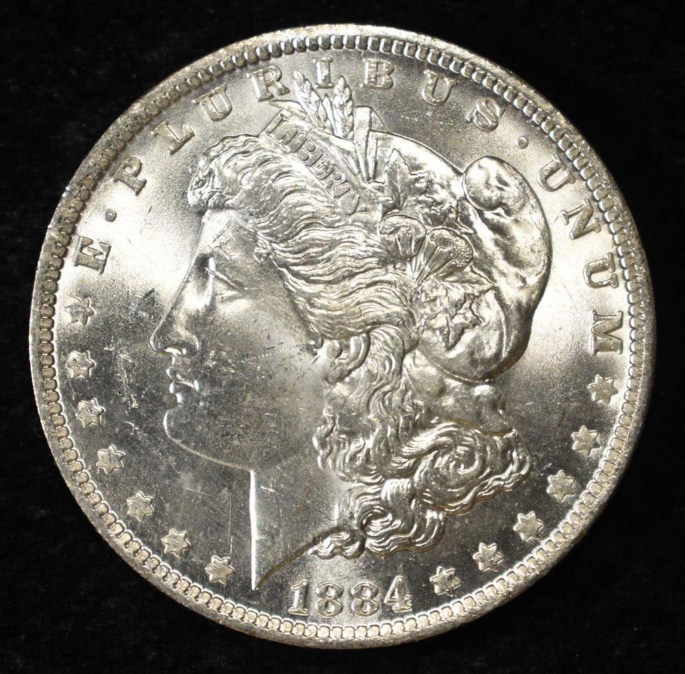 1884-O MORGAN DOLLAR CH BU. TOP RATED AUCTION HOUSE ESTIMATE $130 - $150.