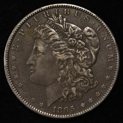 1895-O MORGAN DOLLAR XF. CHECK OUT OUR UPCOMING AUCTIONS ESTIMATE $800 - $900.