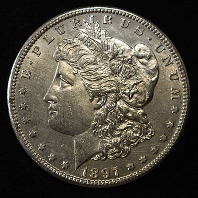 1897-S MORGAN DOLLAR CH BU. CHECK OUT OUR UPCOMING AUCTIONS ESTIMATE $200 - $300.