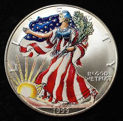 1999 AMERICAN SILVER EAGLE COLORIZED. LEADERS IN ON-LINE AUCTIONS ESTIMATE $110 - $160.