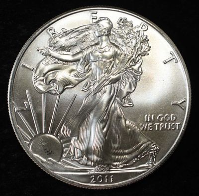 2011 AMERICAN SILVER EAGLE. LEADERS IN ON-LINE AUCTIONS ESTIMATE $110 - $160.