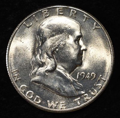 1949-S FRANKLIN HALF DOLLAR BU. BID WITH SILVER CITY AUCTIONS ESTIMATE $60 - $80.