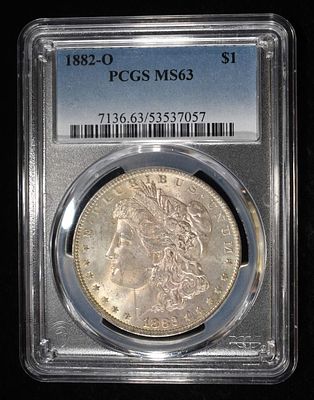 1882-O MORGAN DOLLAR PCGS MS-63. TOP RATED AUCTION HOUSE ESTIMATE $130 - $150.