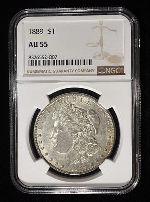 1889 MORGAN DOLLAR NGC AU55. TOP RATED AUCTION HOUSE ESTIMATE $90 - $130.