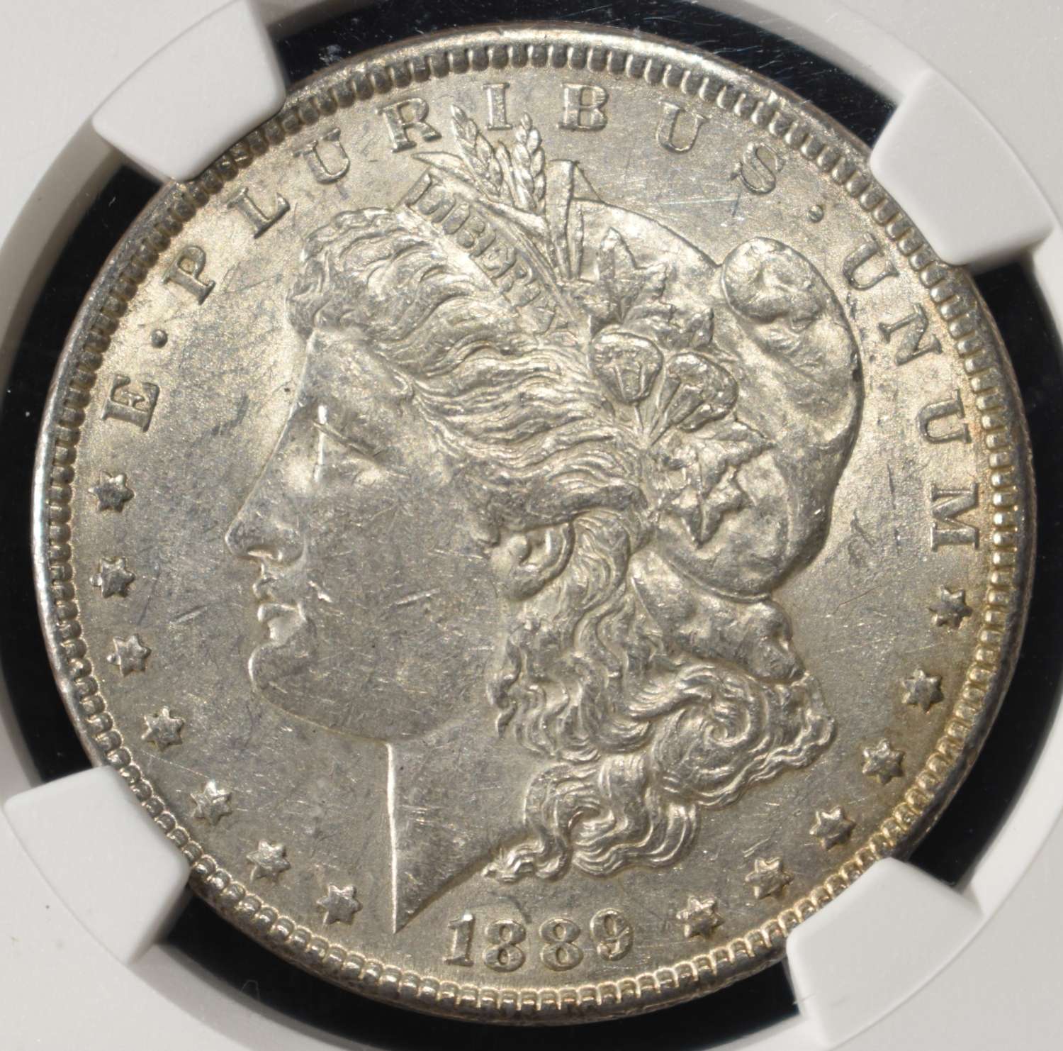 1889 MORGAN DOLLAR NGC AU55
