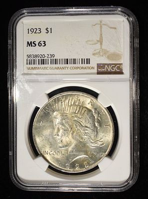 1923 PEACE DOLLAR NGC MS63. WEEKLY COIN & CURRENCY AUCTIONS ESTIMATE $90 - $130.