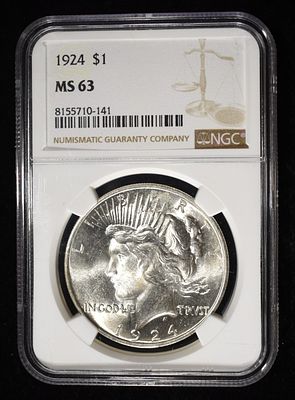 1924 PEACE DOLLAR NGC MS63. TOP RATED AUCTION HOUSE ESTIMATE $120 - $170.