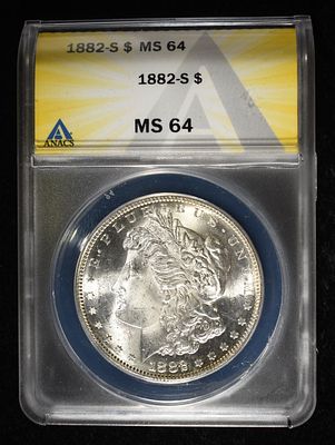 1882-S MORGAN DOLLAR ANACS MS-64. CHECK OUT OUR UPCOMING AUCTIONS ESTIMATE $150 - $200.
