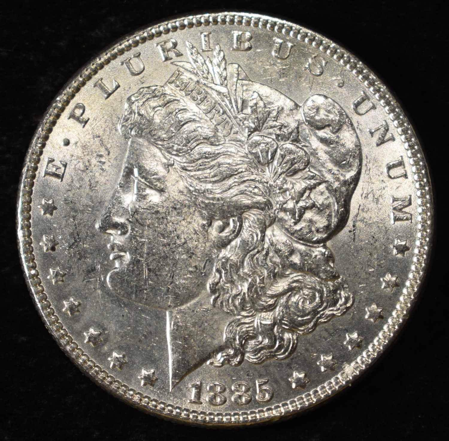 1885 MORGAN DOLLAR AU