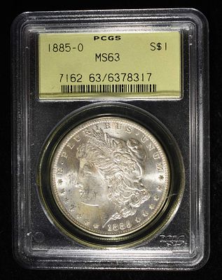 1885-O MORGAN DOLLAR PCGS MS-63 OLD GREEN HOLDER. LEADERS IN ON-LINE AUCTIONS ESTIMATE $130 - $150.