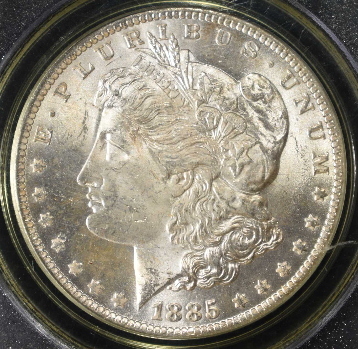 1885-O MORGAN DOLLAR PCGS MS-63 OLD GREEN HOLDER