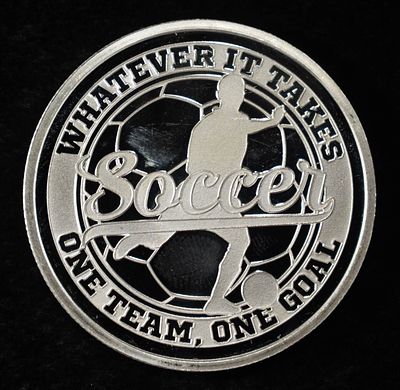 SOCCER 1 OZ .999 SILVER ROUND. WEEKLY COIN & CURRENCY AUCTIONS ESTIMATE $120 - $160.