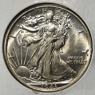 1943 WALKING LIBERTY HALF DOLLAR BU. CHECK OUT OUR UPCOMING AUCTIONS ESTIMATE $60 - $80.