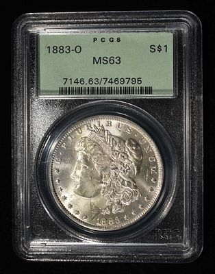 1883-O MORGAN DOLLAR PCGS MS-63 OLD GREEN HOLDER. CHECK OUT OUR UPCOMING AUCTIONS ESTIMATE $130 