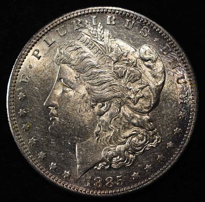 1885-S MORGAN DOLLAR BU COLOR. TOP RATED AUCTION HOUSE ESTIMATE $350 - $400.