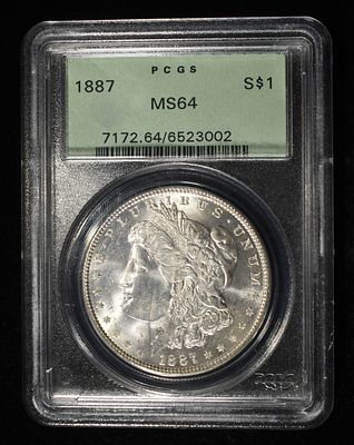 1887 MORGAN DOLLAR PCGS MS-64 OLD GREEN HOLDER. BID WITH SILVER CITY AUCTIONS ESTIMATE $150 - $200.