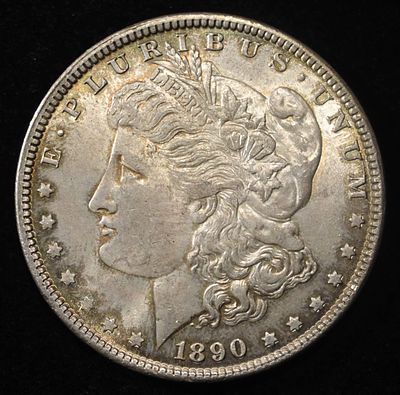 1890 MORGAN DOLLAR GEM ORIG UNC. CHECK OUT OUR UPCOMING AUCTIONS ESTIMATE $850 - $950.