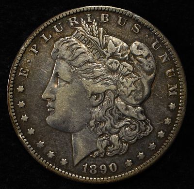 1890-O MORGAN DOLLAR. WEEKLY COIN & CURRENCY AUCTIONS ESTIMATE $80 - $120.