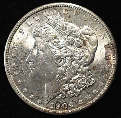 1904 MORGAN DOLLAR BU. TOP RATED AUCTION HOUSE ESTIMATE $180 - $200.
