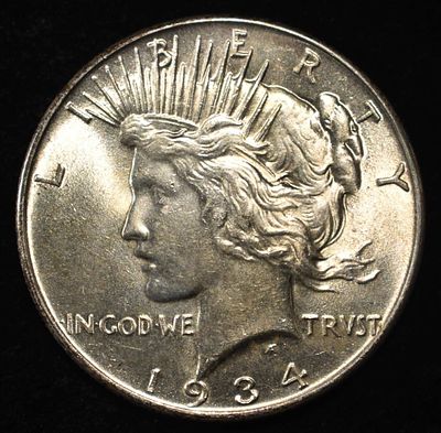 1934 PEACE DOLLAR CH BU. TOP RATED AUCTION HOUSE ESTIMATE $300 - $400.
